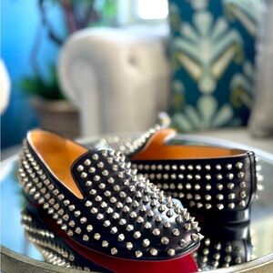 Christian Louboutin flats spiked